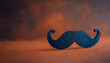 A blue fake mustache is on a red background