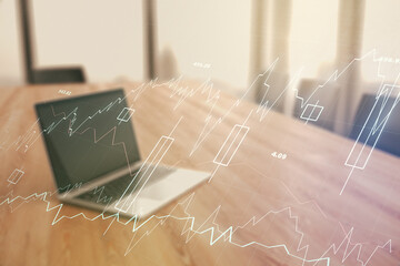 Abstract creative financial graph on modern laptop background, forex and investment concept. Multiexposure