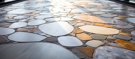 Poster - A cobblestone walkway lined with rocks, blending seamlessly into the landscape. The stone path creates a natural and rustic flooring for the outdoor event