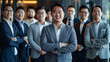 © BB_Stock - Group of business people and new generation teams standing in front of the office Demonstrate confidence and professionalism to reach your goals.
