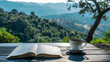 An open book and a coffee cup are placed on a wooden table next to a beautiful hill view as a background with a relaxed ambience. Background for relaxation, vacation and rest time.