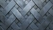 Abstract background of overlapping metal plates with a geometric pattern. The plates are painted in dark gray color and have a rough texture.
