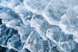 Close-up on the crystalline structure of ice on a frozen lake, highlighting the intricate patterns formed by nature