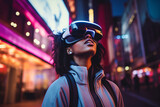 Fototapeta Młodzieżowe - This is a street photo with a man wearing a VR helmet, taken in an urban environment. For entertainment and technological use and conveys the idea of immersion in another world
