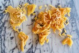 Fototapeta Sypialnia - europe and asia fashioned from pasta varieties on marble