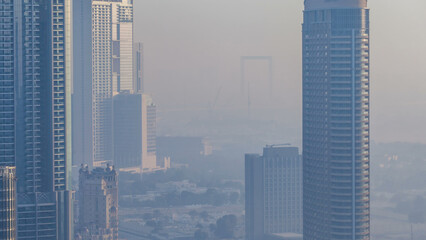 Wall Mural - Foggy morning in downtown of Dubai timelapse.