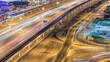 Sheikh Zayed Road traffic in Dubai Marina and Jumeirah Lakes Towers districts night timelapse