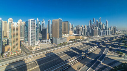 Wall Mural - Dubai Marina skyscrapers aerial top view during all day from JLT in Dubai timelapse, UAE.