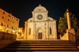 Fototapeta  - Amazing night view with the beautiful medieval architecture of the St. James cathedral in the old town of Shibenik, Croatia.