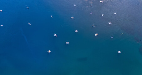 Wall Mural - Aerial view white yachts stands in azure transparent water sea, beach Blue Lagoon Comino Malta