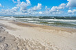Summer scene of Baltic sea - sand, beach and sea. Beautiful blue sky with cumulous cloud.	