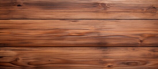 Canvas Print - A closeup shot displaying the intricate pattern of a brown hardwood plank table with a glossy varnish finish, set against a blurred background