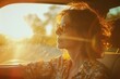 A woman with a serene expression drives her car, bathed in sunlight. The warm rays illuminate the interior as she navigates the road ahead