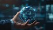 © netrun78 - Hand presenting a holographic globe with economic growth charts symbolizing global business trends and data analysis..