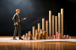 © photosaint - miniature people. figure of a businessman with a graphic indicator of sales growth and income of business production. building