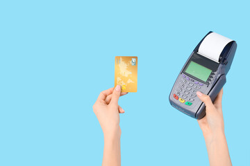 Poster - Woman with credit card and payment terminal on blue background