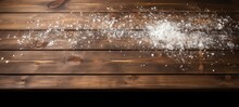 A pile of salt on a wooden table with some other items. Generative AI.