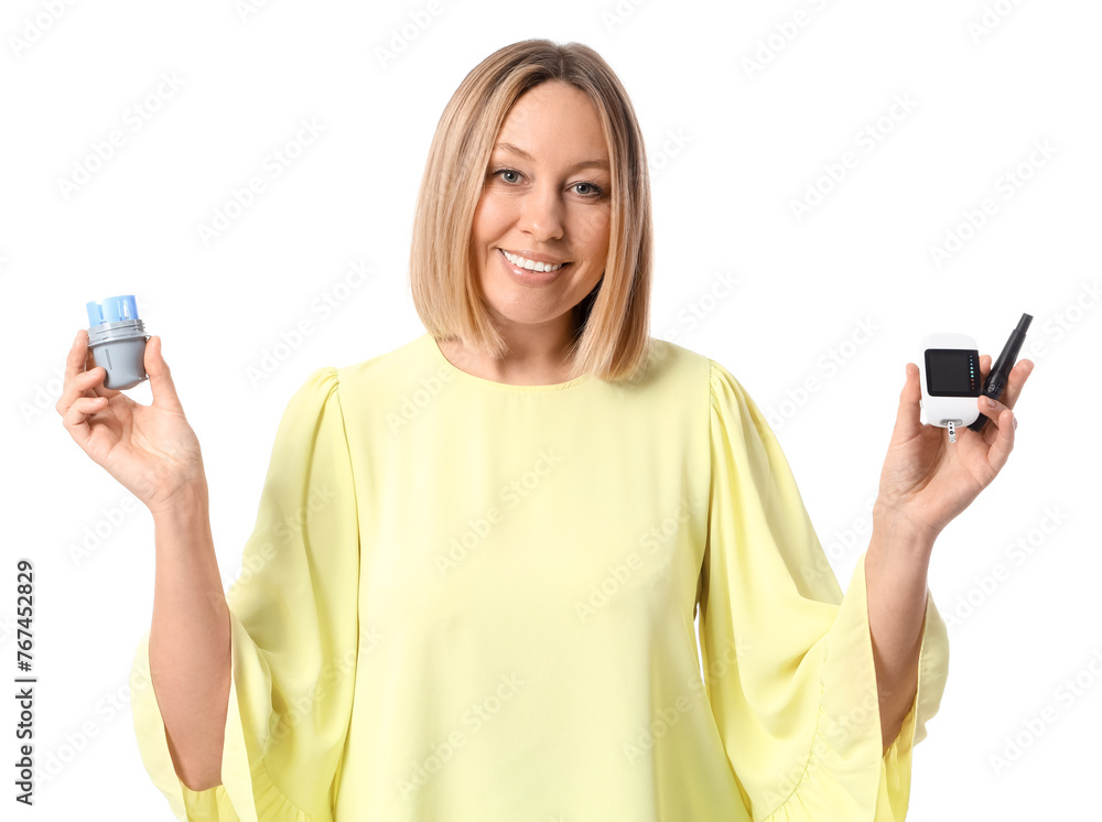 Diabetic woman with glucose sensor, lancet pen and glucometer on white background