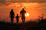 Fototapeta  - Mom and dad with boy silhouette walking hand in hand among rural field during magic sunset hour