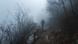 Despite the ominous presence of danger a hiker ventures deeper into the mist oblivious to the potential risks that lie ahead.