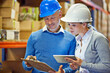 © T. Rose/peopleimages.com - Teamwork, shipping and warehouse with tablet and clipboard for inventory management, checklist and logistics. People at storage facility, digital and distribution paperwork for quality assurance