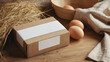 Egg packaging cardboard box on linen cloth. Fresh organic chicken eggs in carton pack a rustic background. Packaging mock up with copy space. 
