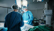 © SneakyPeakPoints/peopleimages.com - Surgery, light or surgeons with teamwork for emergency, accident or healthcare in hospital clinic. ICU, medical operation or doctors in surgical collaboration in operating room to support or help