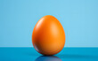 chicken yellow egg on a blue background. breakfast food