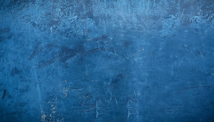 Dark blue shabby metal texture, abstract background with scratches; horizontal industrial photo