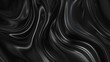 A black and white image of a black fabric with a wavy pattern. The image has a moody and mysterious feel to it