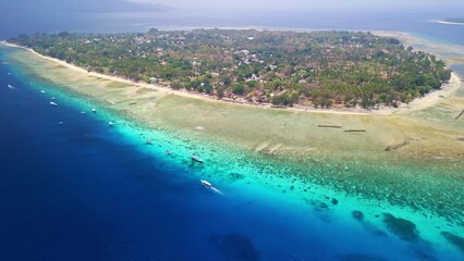 Wall Mural - Flying towards the tiny island of Gili Air off the coast of Lombok, Indonesia