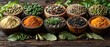 A variety of spices are displayed in wooden bowls on a wooden table. The spices include black pepper, cumin, and paprika