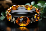 Fototapeta  - An exquisite and expensive amber bracelet on the hand.