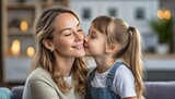 Fototapeta Tulipany - Daughter kissing her mother on the cheek, Mother's Day, parenting, family