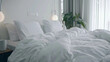 Cozy unmade bed bathed in soft morning light showcasing casual comfort in a modern home.