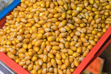 Wall Mural - Ginkgo Biloba Nuts in Tub at Farmers Market in Hong Kong