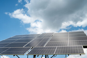 Wall Mural - Photovoltaic solar panel as alternative electricity source against blue sky