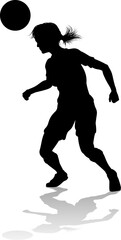 Wall Mural - A female soccer football player woman in silhouettes