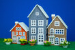 Three colorful beautiful toy houses
