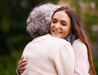 Poster - Hug, mother and woman outdoor with love, embrace and affection for bonding with happiness. Family, elderly female person and daughter with mom in garden, backyard and terrace with smile in nature