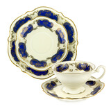 Fototapeta Na ścianę - Porcelain vintage cup saucer and plate isolated on white. Vintage Bavarian teaware.