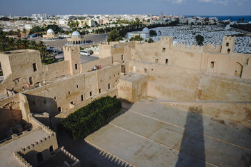 Sticker - Ribat of Monastir coastal city, Sahel area, Sidi el Mezeri Muslim cemetery on background, Tunisia