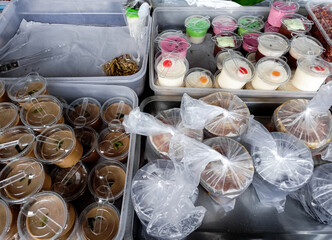 Various kinds of takjil for breaking fast. Snacks on display.