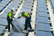© ultramansk - Photovoltaic engineers work on floating photovoltaics. workers Inspect and repair the solar panel equipment floating on water. Engineer working setup Floating solar panels Platform system on the lake.