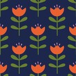 Seamless pattern design. Symmetrical orange flowers with green leaves.