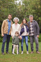 Canvas Print - Family, grandparents and parents with child in portrait for bonding, happiness and picture in park. Outdoor, nature and old people with mother or father and kid for weekend or holiday together