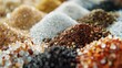Extreme close-up of diverse sugar types creating a colorful and textured landscape for culinary use.