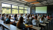 © petrrgoskov - University Lecture Hall with Students and Professors, Students attentively listening to professors in a university lecture hall with a complex chalkboard diagram in the background.
