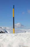 Fototapeta Boho - snow warning post during snowfall in the mountains in winter