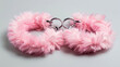 Pink sexy fluffy handcuffs. Accessory for love games